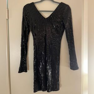 Black long sleeve sequin bodycon dress. Low V back.